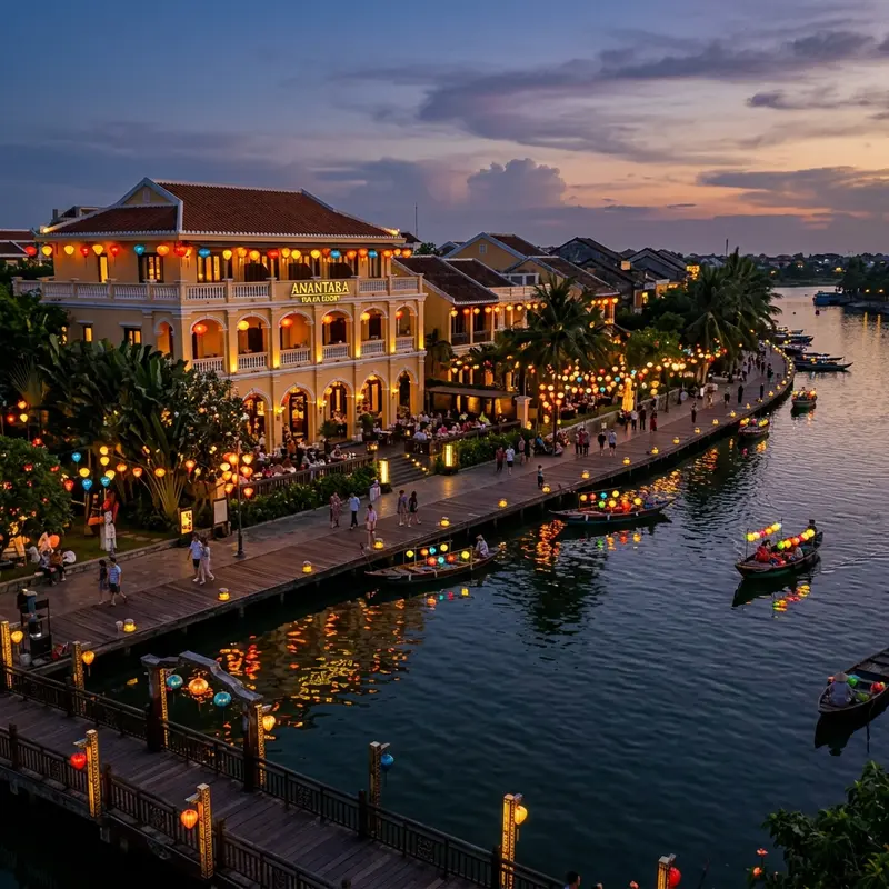 Anantara Hoi An Resort by Thu Bon River in the evening with glowing lanterns