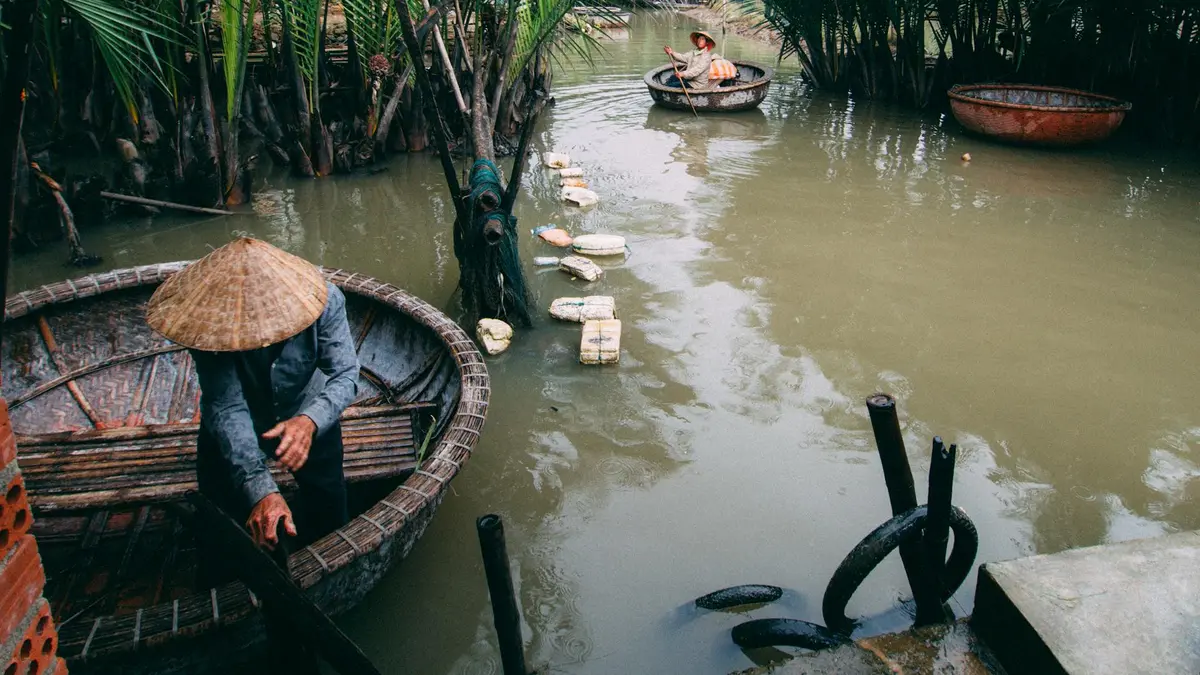 Traditional bamboo basket boats on the Rung Dua Bay Mau river