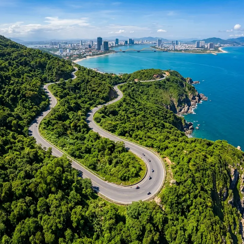 Son Tra Peninsula pass road with lush forest and sea views from above